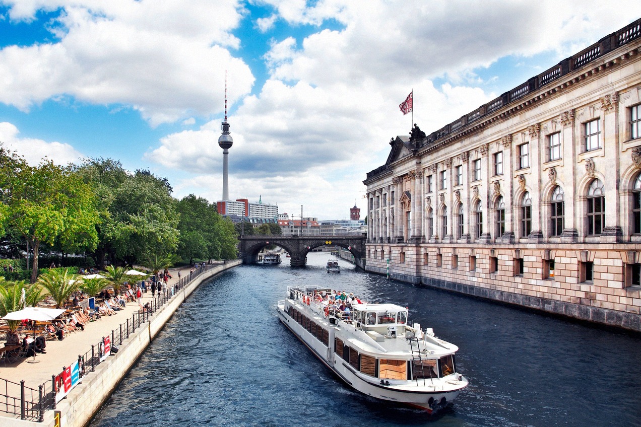 Excursion boat on the Spree at Museum Island, with the Bode Museum on the right and the TV Tower in the background