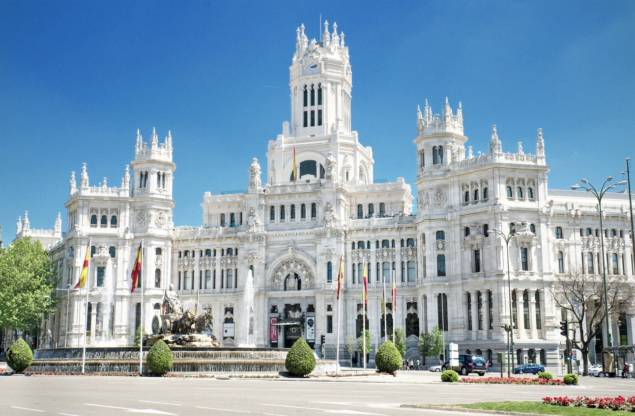 The white Palacio de Cibeles on Plaza de Cibeles in Madrid